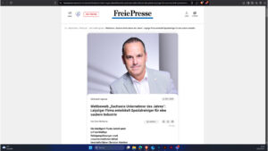 ein screenshot eines Artikels der Seite "Freie Presse". Es zeigt das Portrait von Christian Römlein, der Geschäftsführer von intelligent fluids GmbH. Der Artikel handelt darüber, dass Herr Römlein zum Unternehmer des Jahres nominiert wurde.